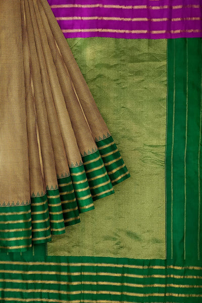 Handwoven Gadwal pure silk saree in mustard & black  in fine checks   and  a contrast pallu in green .
