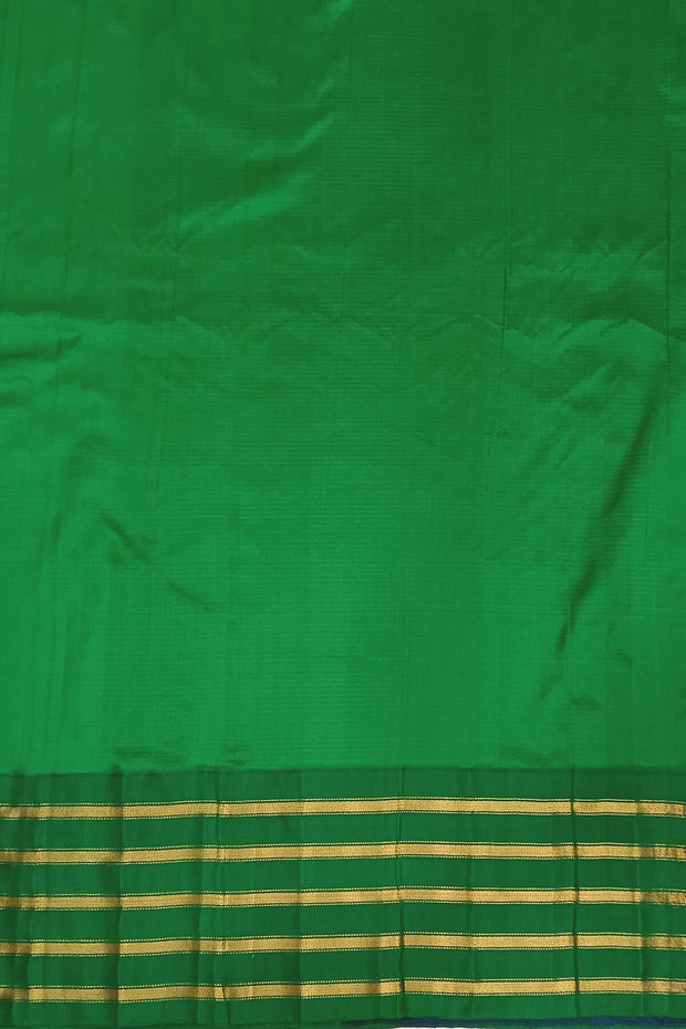 Handwoven Gadwal pure silk saree in mustard & blue  in fine checks   and  a contrast pallu in green .
