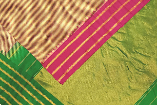 Handwoven Gadwal pure silk saree in mustard & blue  in fine checks   and  a contrast pallu in green .