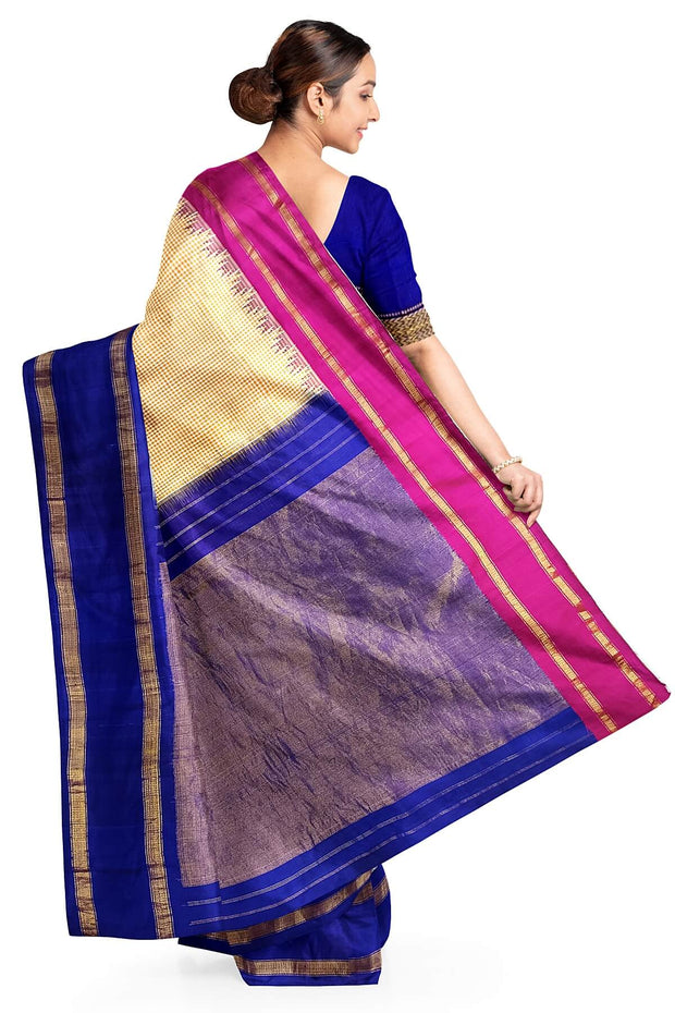 Handwoven Gadwal pure silk saree in cream & orange  in fine checks   and  a contrast pallu in blue .