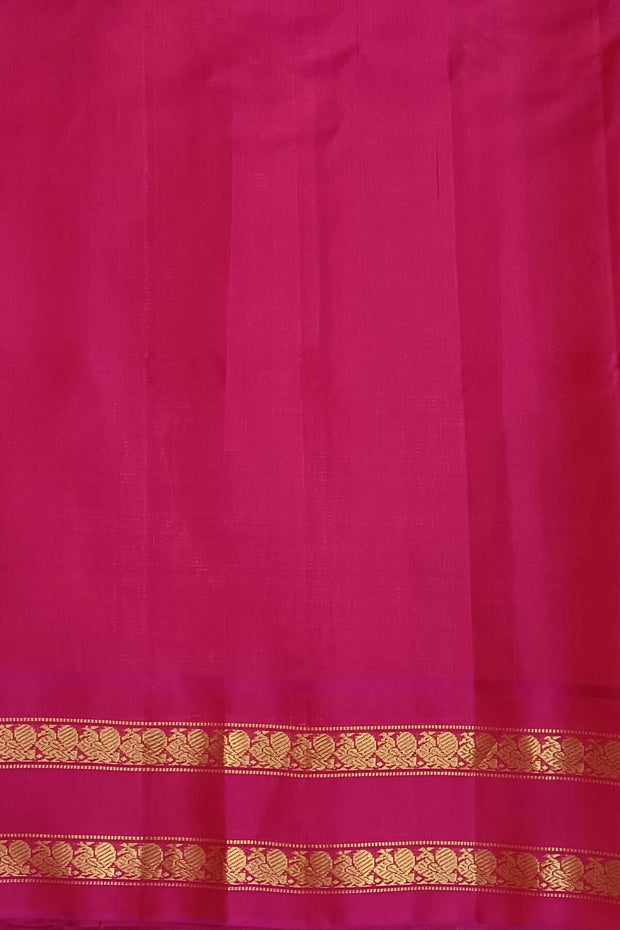 Handwoven Gadwal pure silk saree in cream  in fine checks   and  a contrast pallu in pink .