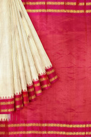 Handwoven Gadwal pure silk saree in cream  in fine checks   and  a contrast pallu in pink .