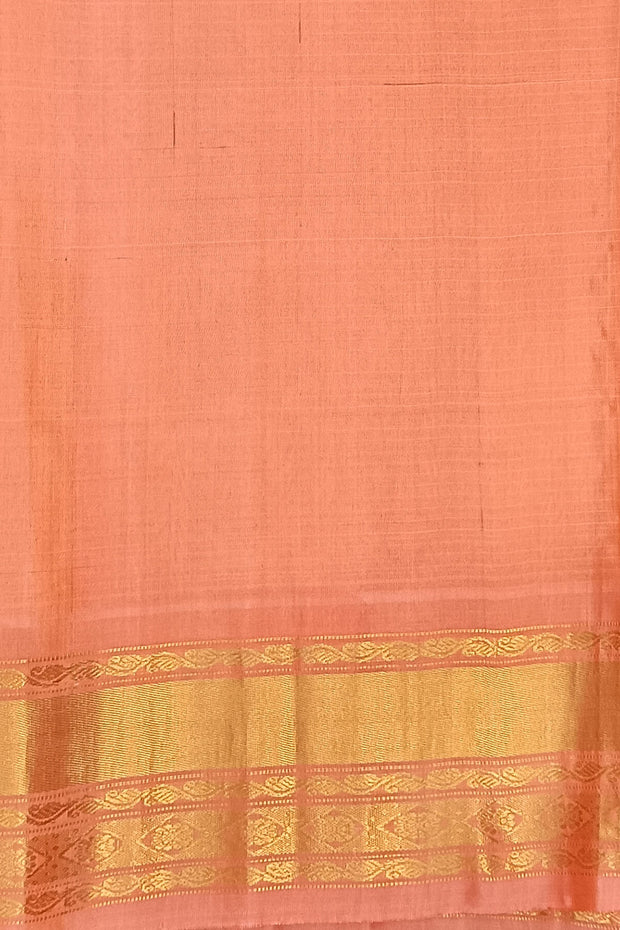 Handwoven Gadwal pure silk saree in wine in fine checks  with small motifs   and  a contrast pallu in peach .