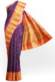 Handwoven Gadwal pure silk saree in wine in fine checks  with small motifs   and  a contrast pallu in peach .