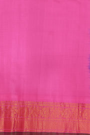 Handwoven Gadwal pure silk saree in violet in fine checks   with small motifs   and  a contrast pallu in baby pink