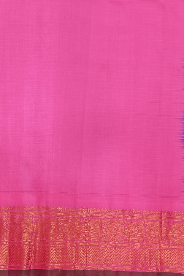 Handwoven Gadwal pure silk saree in violet in fine checks   with small motifs   and  a contrast pallu in baby pink