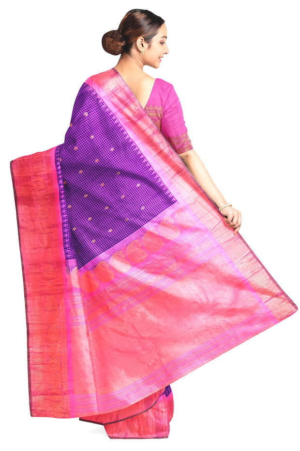 Handwoven Gadwal pure silk saree in violet in fine checks   with small motifs   and  a contrast pallu in baby pink