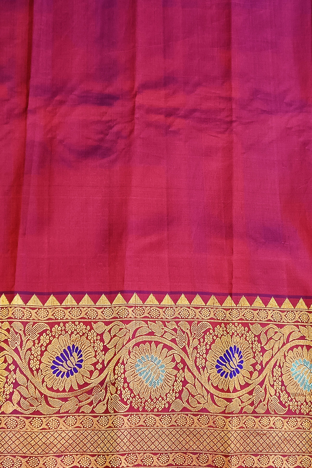 Handwoven Gadwal pure silk saree in pink with gold & silver motifs  all over the body.