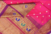 Handwoven Gadwal pure silk saree in pink with gold & silver motifs  all over the body.