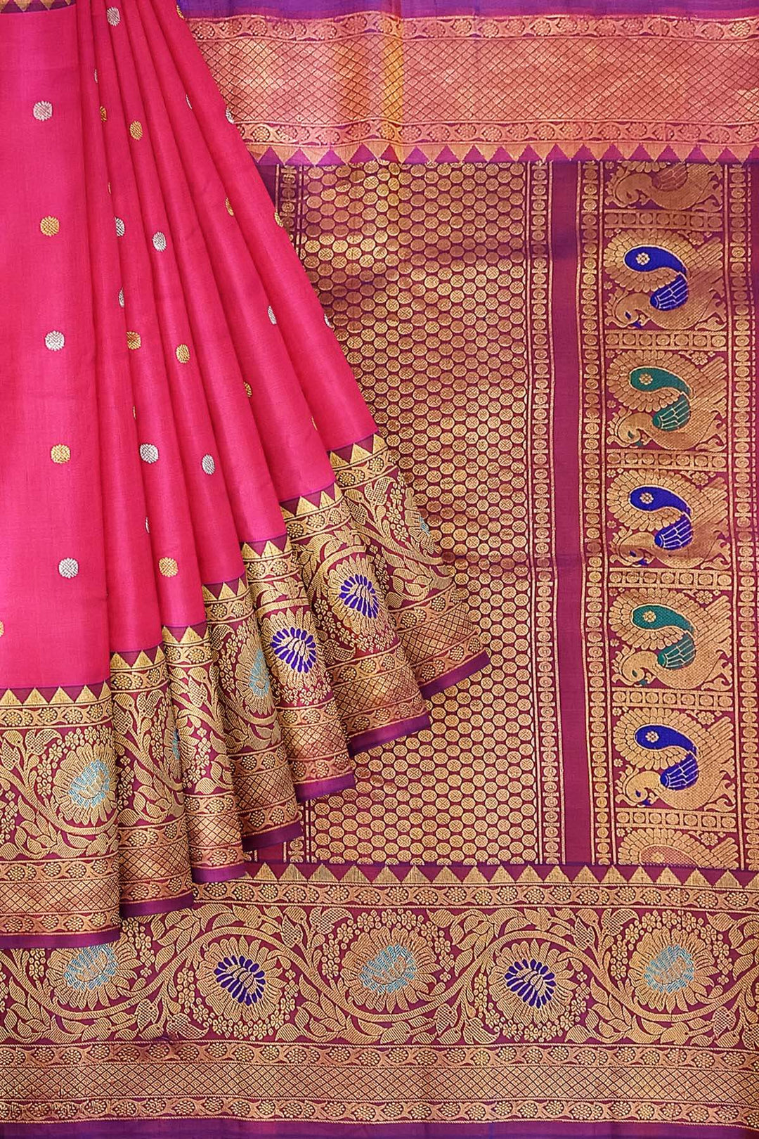 Handwoven Gadwal pure silk saree in pink with gold & silver motifs  all over the body.