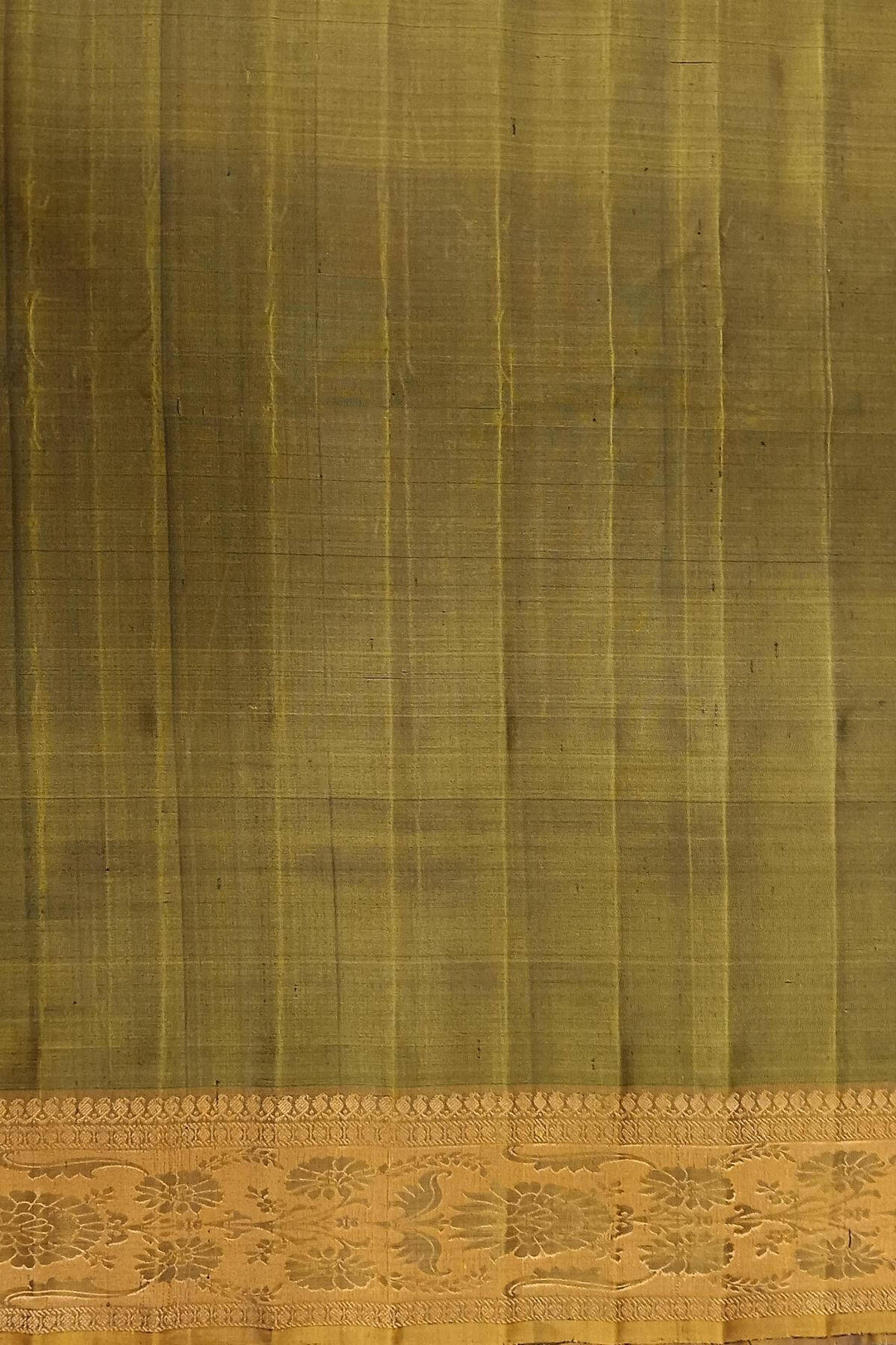 Handwoven Gadwal pure silk saree in bottle green with gold  motifs  all over the body.