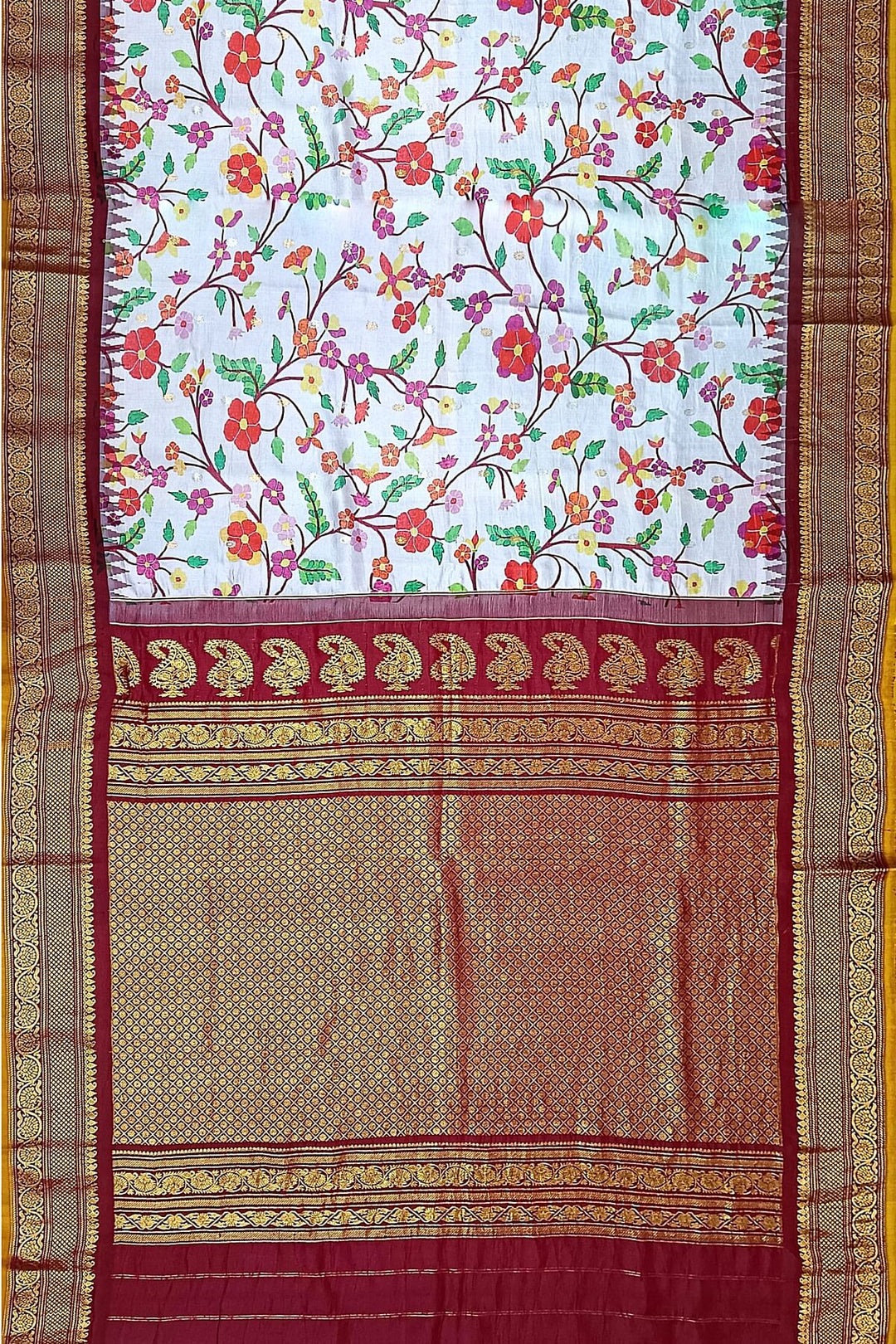 Handwoven Gadwal pure silk floral printed saree in lavender  .