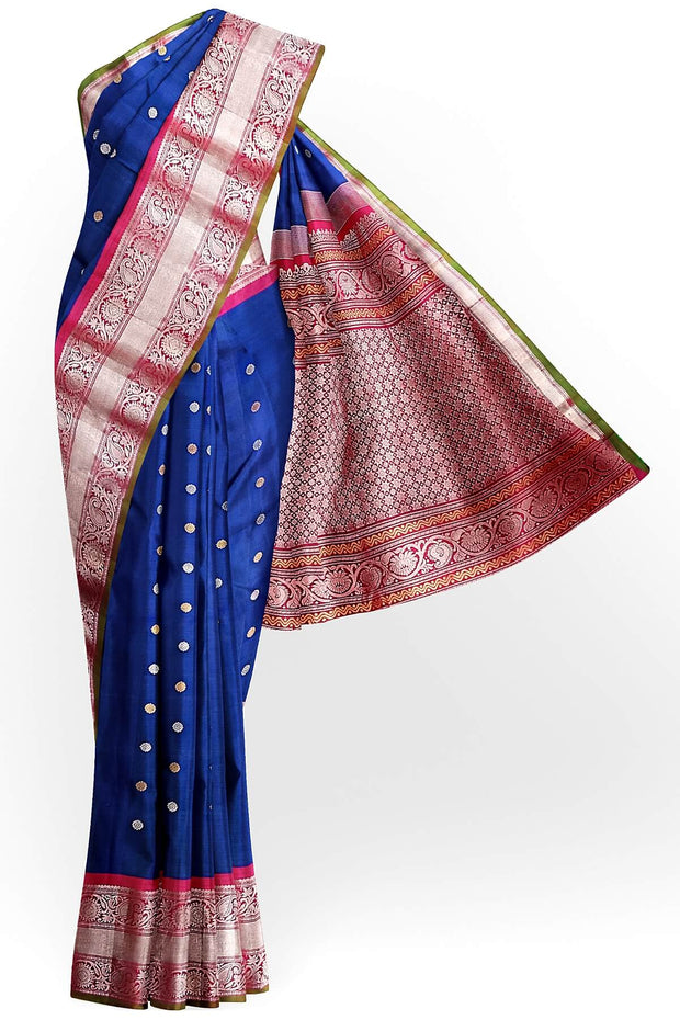 Handwoven Gadwal pure silk saree in peacock blue with floral and paisley  motifs in gold & silver.