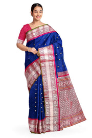 Handwoven Gadwal pure silk saree in peacock blue with floral and paisley  motifs in gold & silver.
