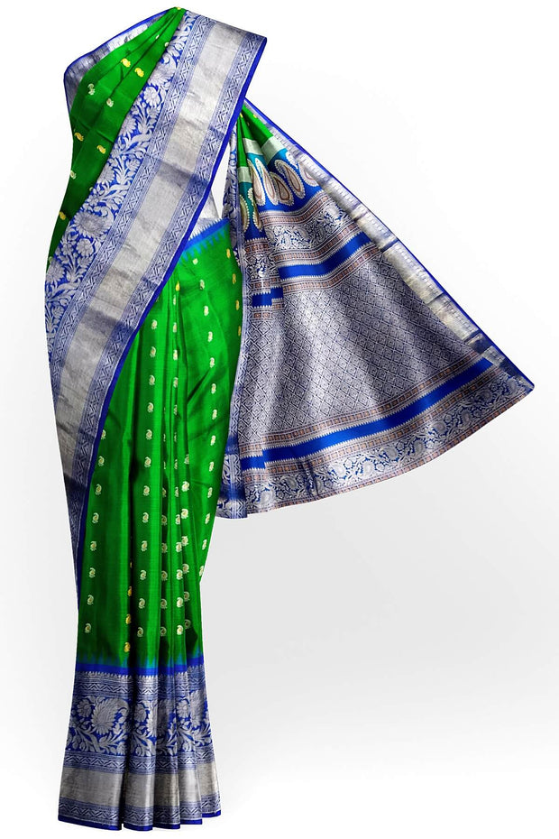 Gadwal pure silk saree in leaf green with  paisley  motifs in gold & silver.