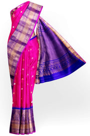 Gadwal pure silk saree in  pink   with  peacock & disc motif in gold & silver.