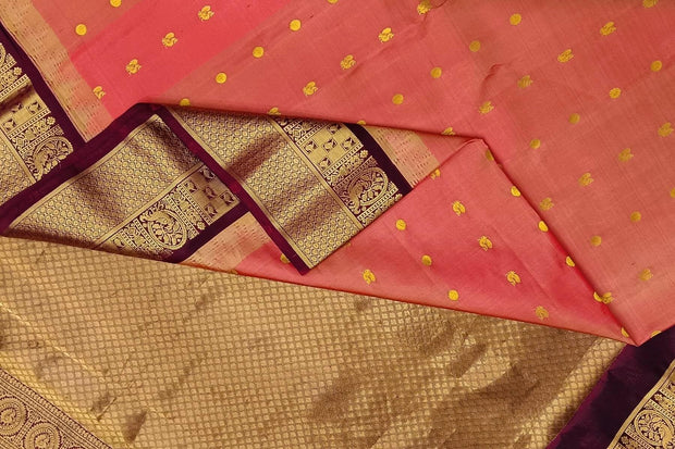 Gadwal pure silk saree in honey with  peacock & disc motif in gold.