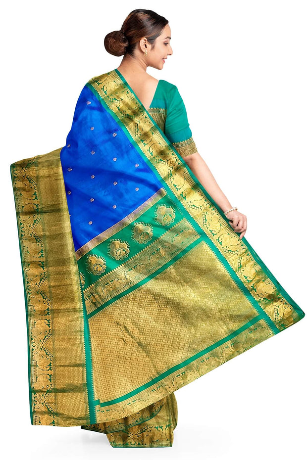 Gadwal pure silk saree in  blue with  peacock & floral motif in gold & silver.