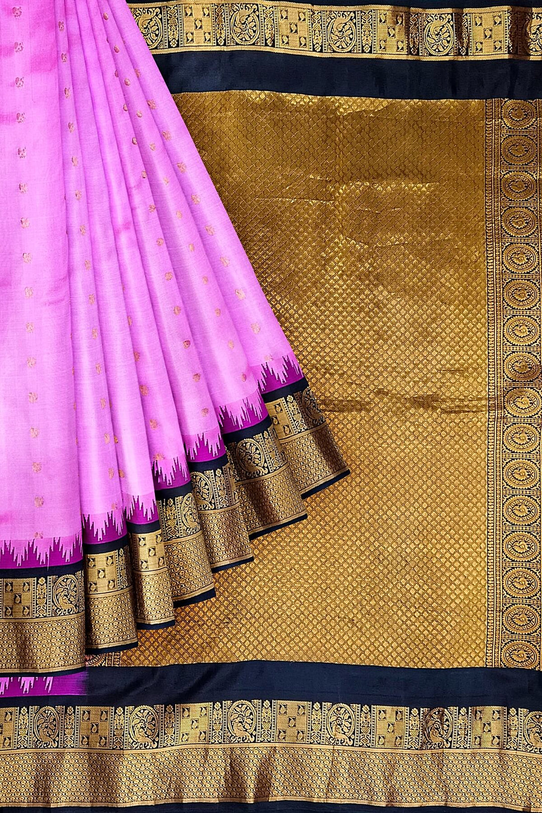 Gadwal pure silk saree in pink with  peacock &  disc  motif in gold.