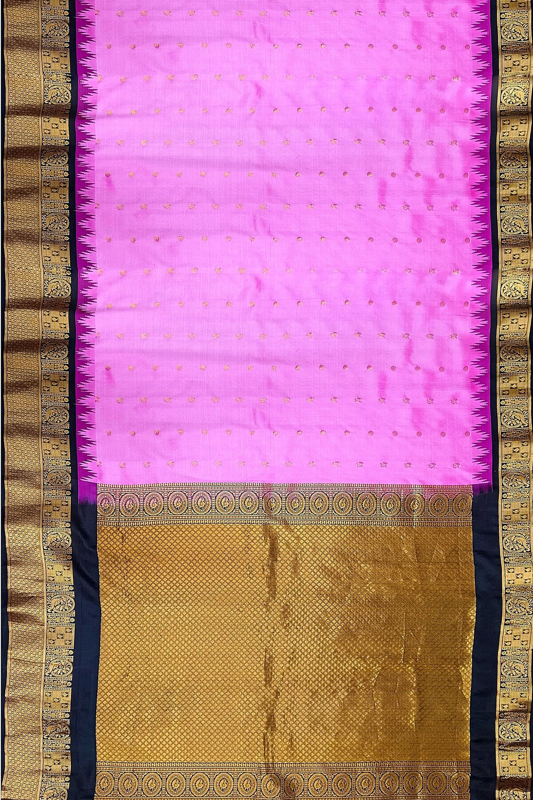 Gadwal pure silk saree in pink with  peacock &  disc  motif in gold.