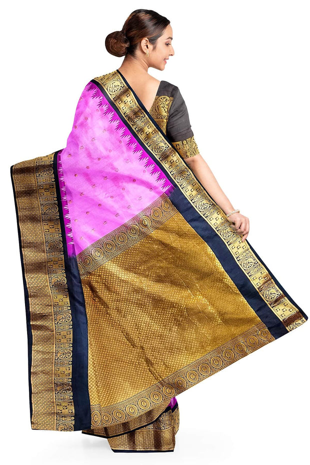 Gadwal pure silk saree in pink with  peacock &  disc  motif in gold.