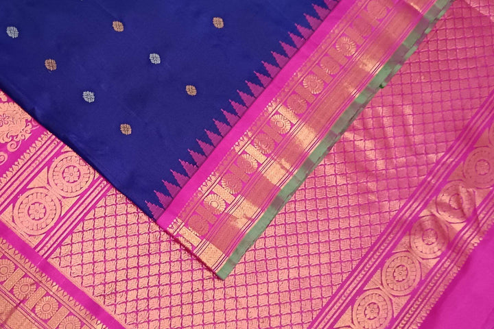 Handwoven Gadwal pure silk saree in royal blue with gold & silver buttis