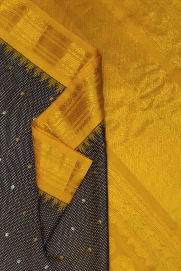 Gadwal pure silk saree in wine in fine checks  with small buttis