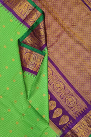 Gadwal pure silk saree in parrot green in fine checks