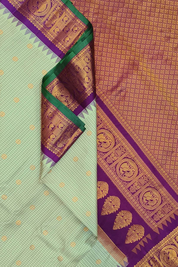 Gadwal pure silk saree in light pista green in fine checks