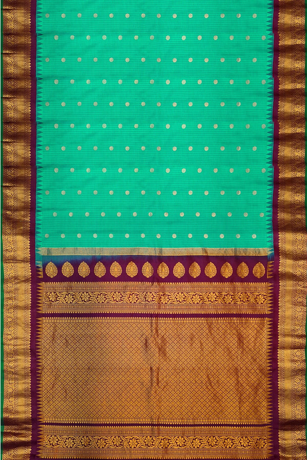 Gadwal pure silk saree in copper sulphate blue in fine checks
