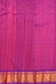 Handwoven Gadwal pure silk saree in mustard with small buttis on the body .