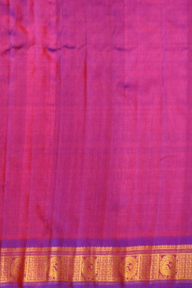 Handwoven Gadwal pure silk saree in mustard with small buttis on the body .