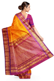 Handwoven Gadwal pure silk saree in mustard with small buttis on the body .