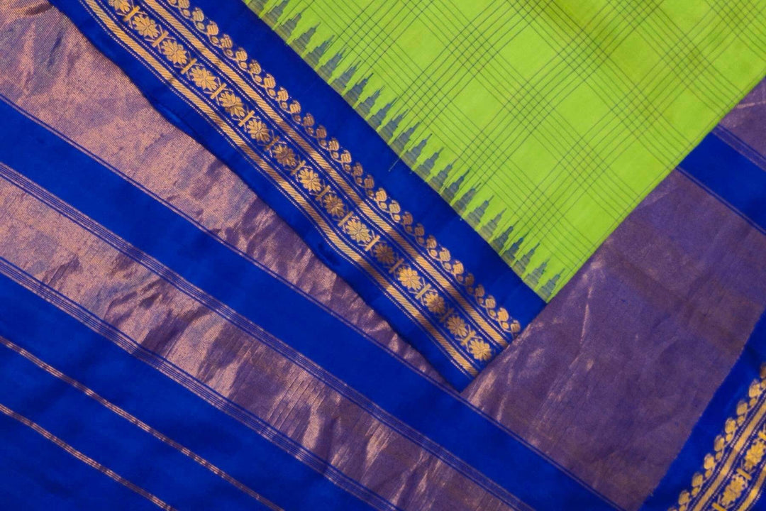 Handwoven Gadwal pure silk saree in light green with stripes & checks