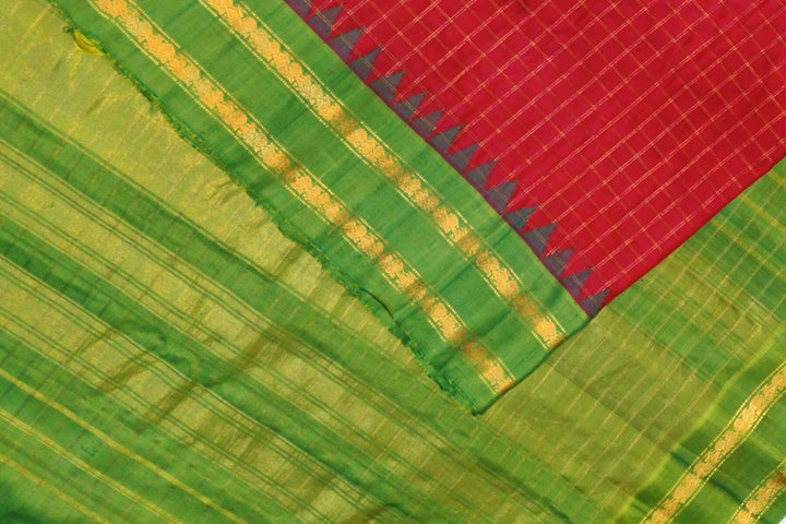 Handwoven Gadwal pure silk saree in red with checks on the body