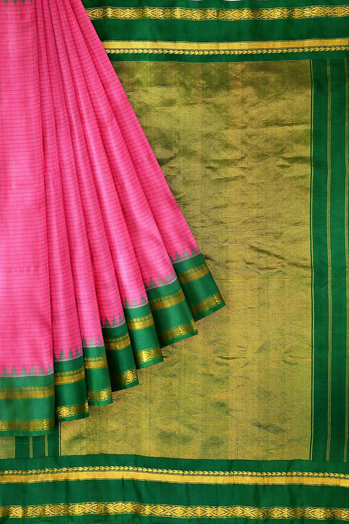 Handwoven Gadwal pure silk saree in pink with checks on the body