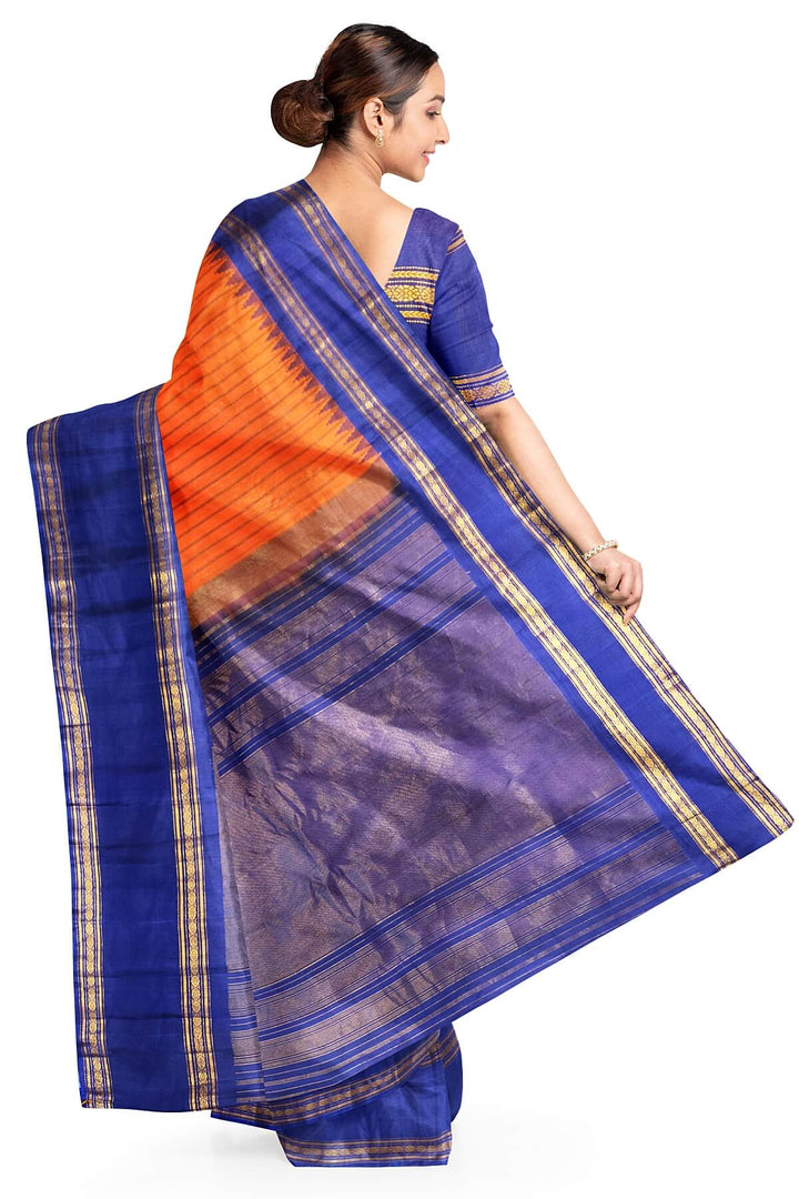 Gadwal pure silk saree in orange with stripes.