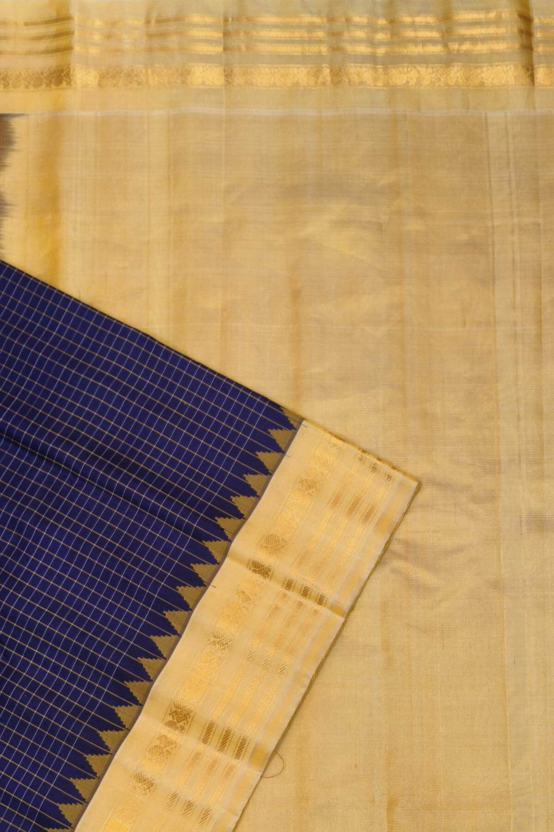 Gadwal pure silk saree in violet with checks.
