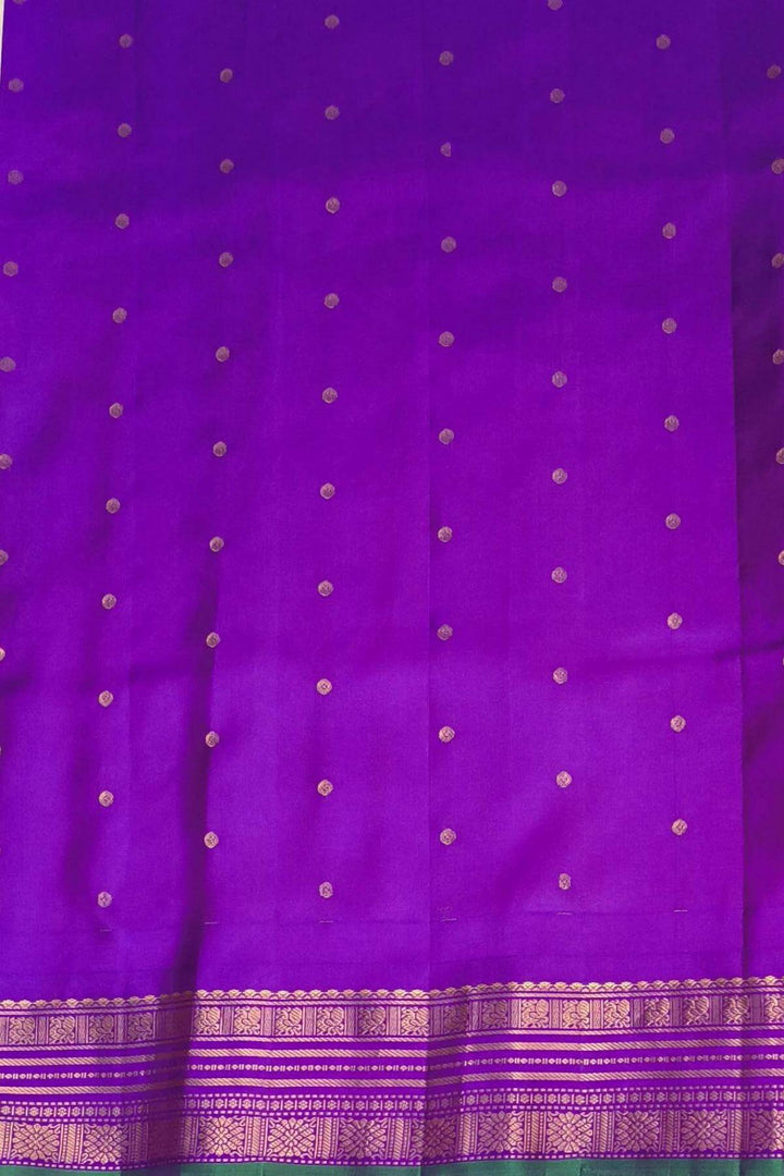 Gadwal pure silk saree with buttis & stripes.