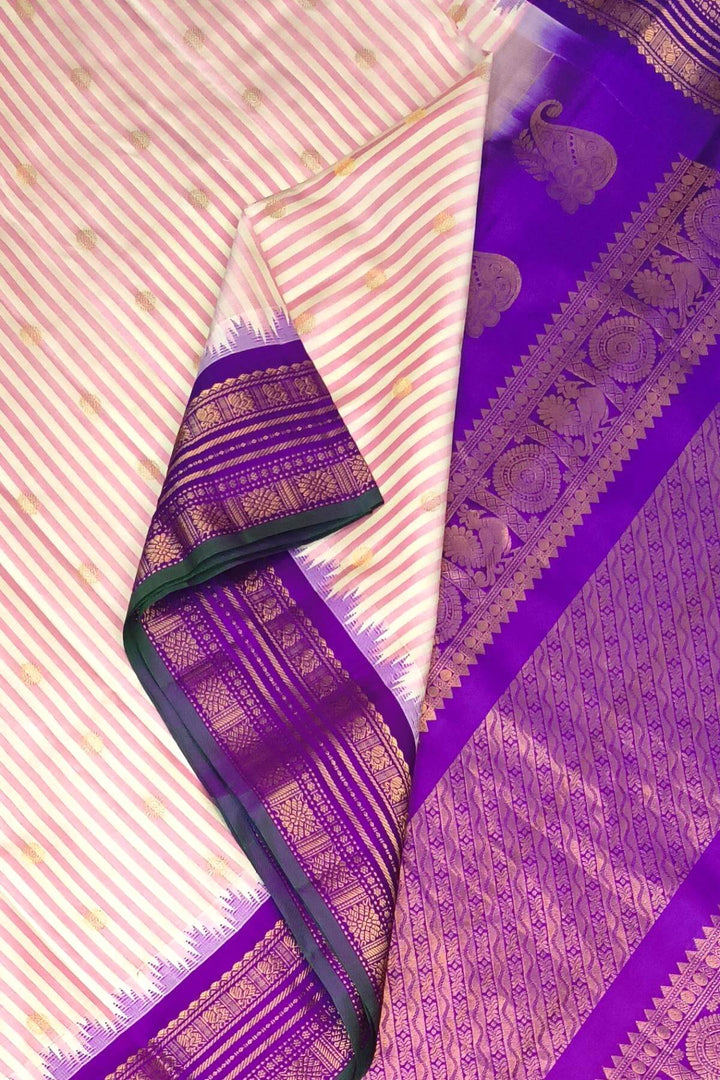 Gadwal pure silk saree with buttis & stripes.