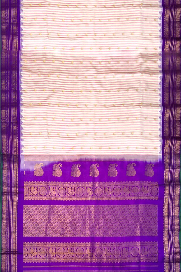 Gadwal pure silk saree with buttis & stripes.