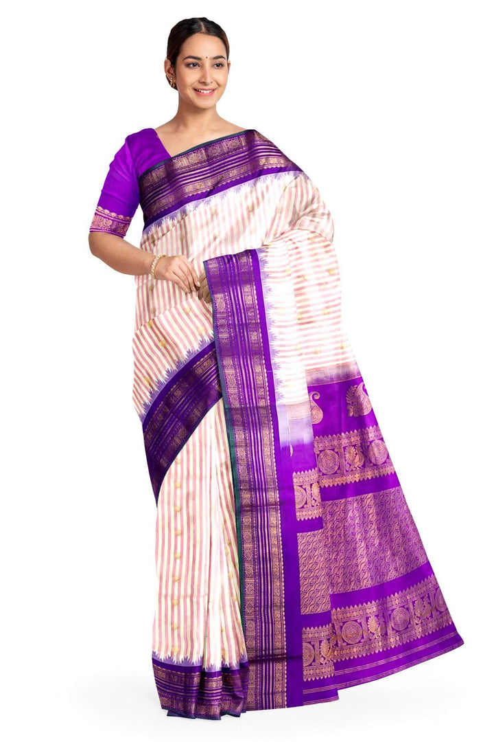 Gadwal pure silk saree with buttis & stripes.