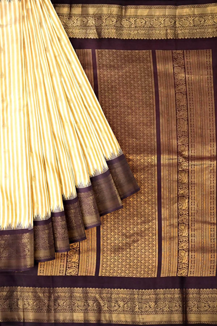 Gadwal pure silk saree in off white with buttis