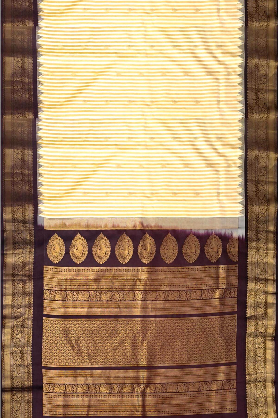 Gadwal pure silk saree in off white with buttis