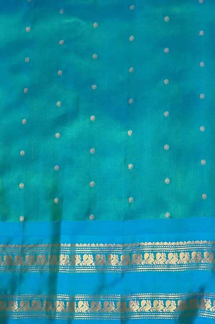 Gadwal pure silk saree with meena buttis & stripes.