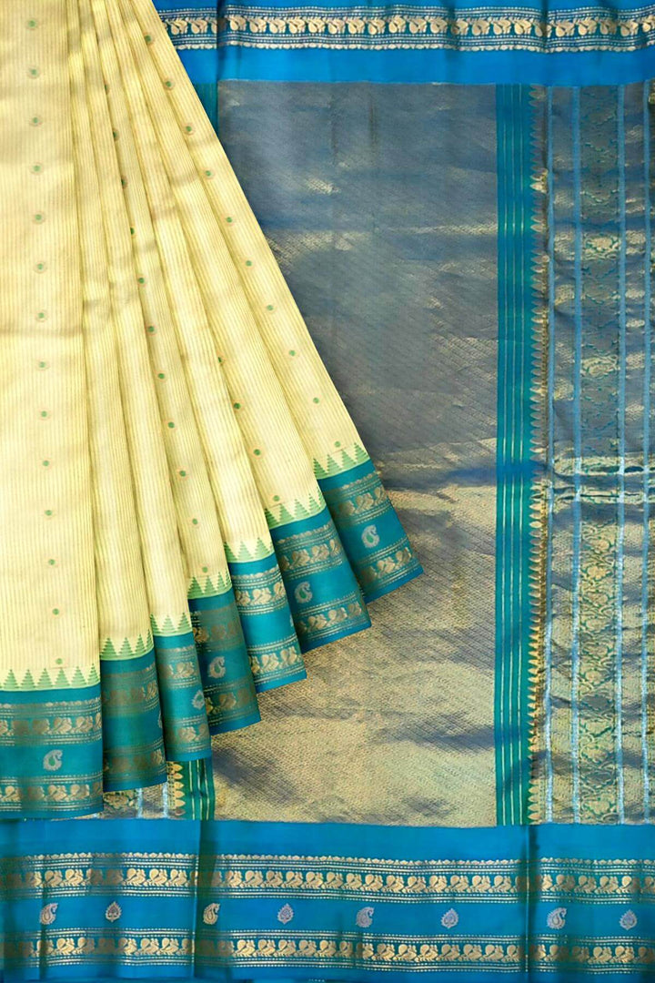 Gadwal pure silk saree with meena buttis & stripes.