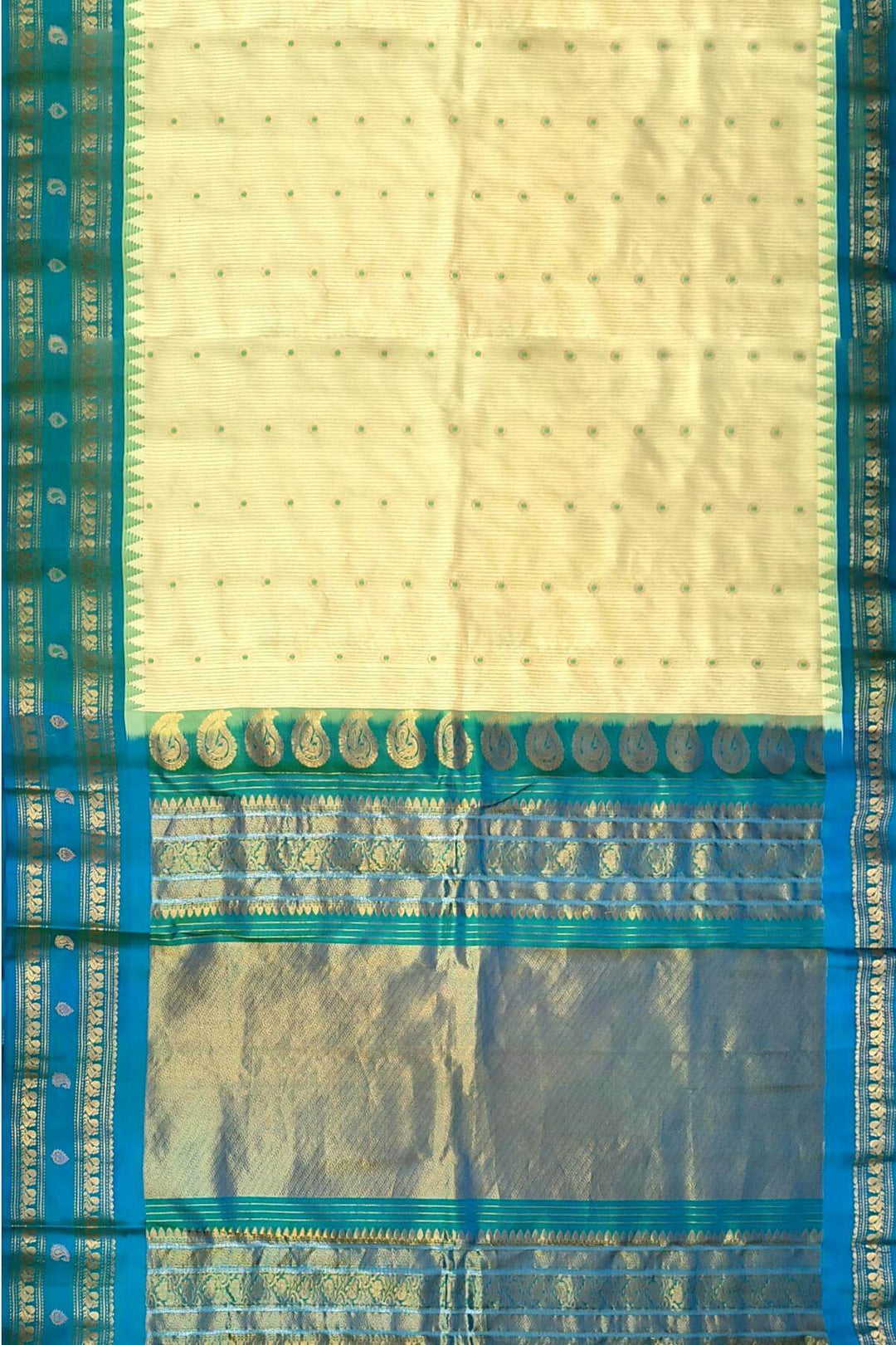 Gadwal pure silk saree with meena buttis & stripes.