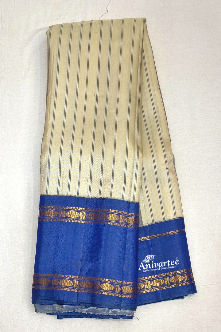 Gadwal pure silk saree in off white in stripes