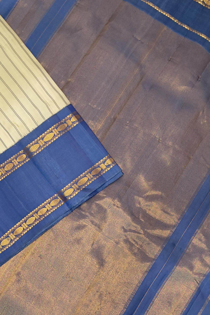 Gadwal pure silk saree in off white in stripes