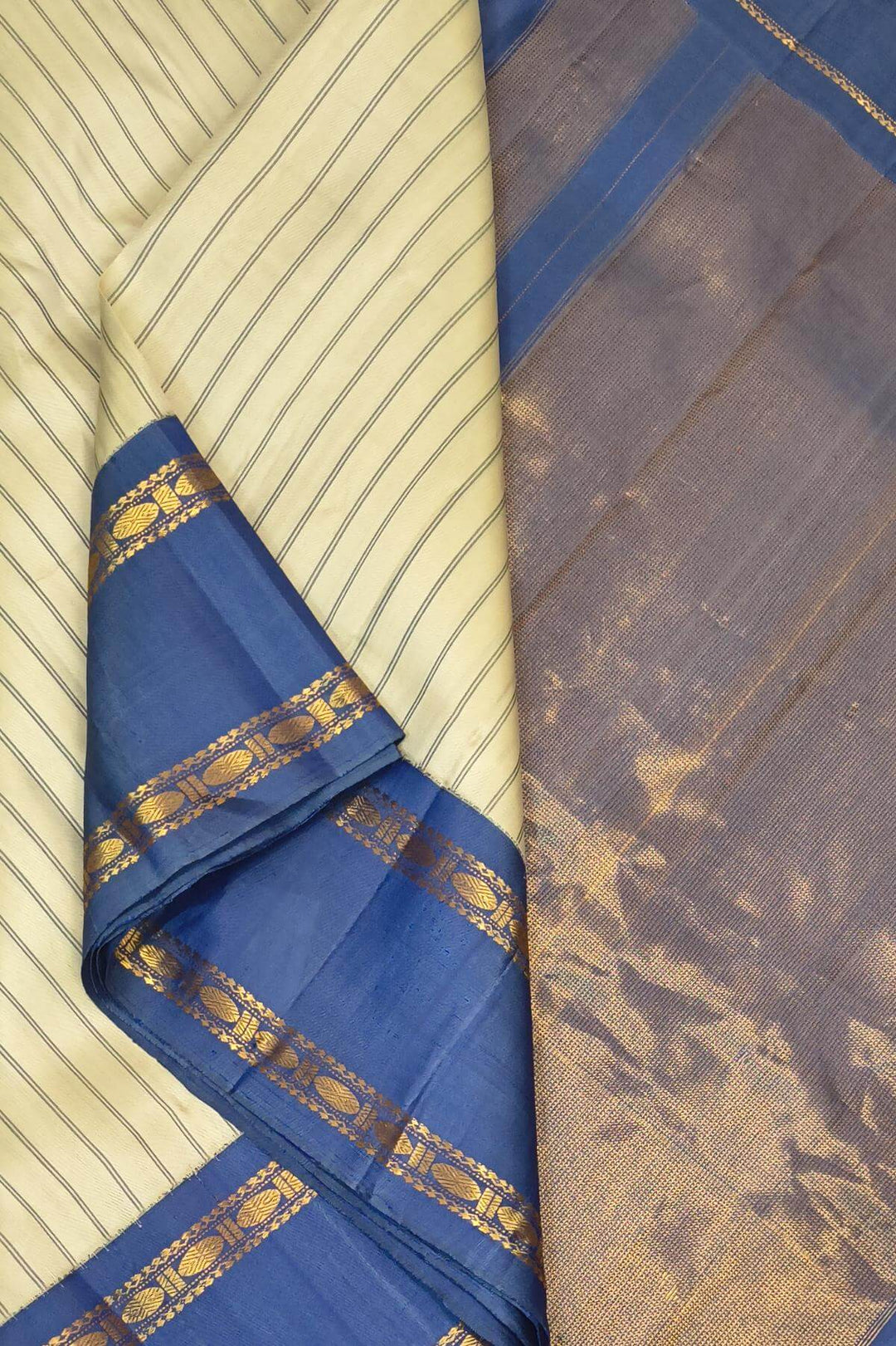 Gadwal pure silk saree in off white in stripes